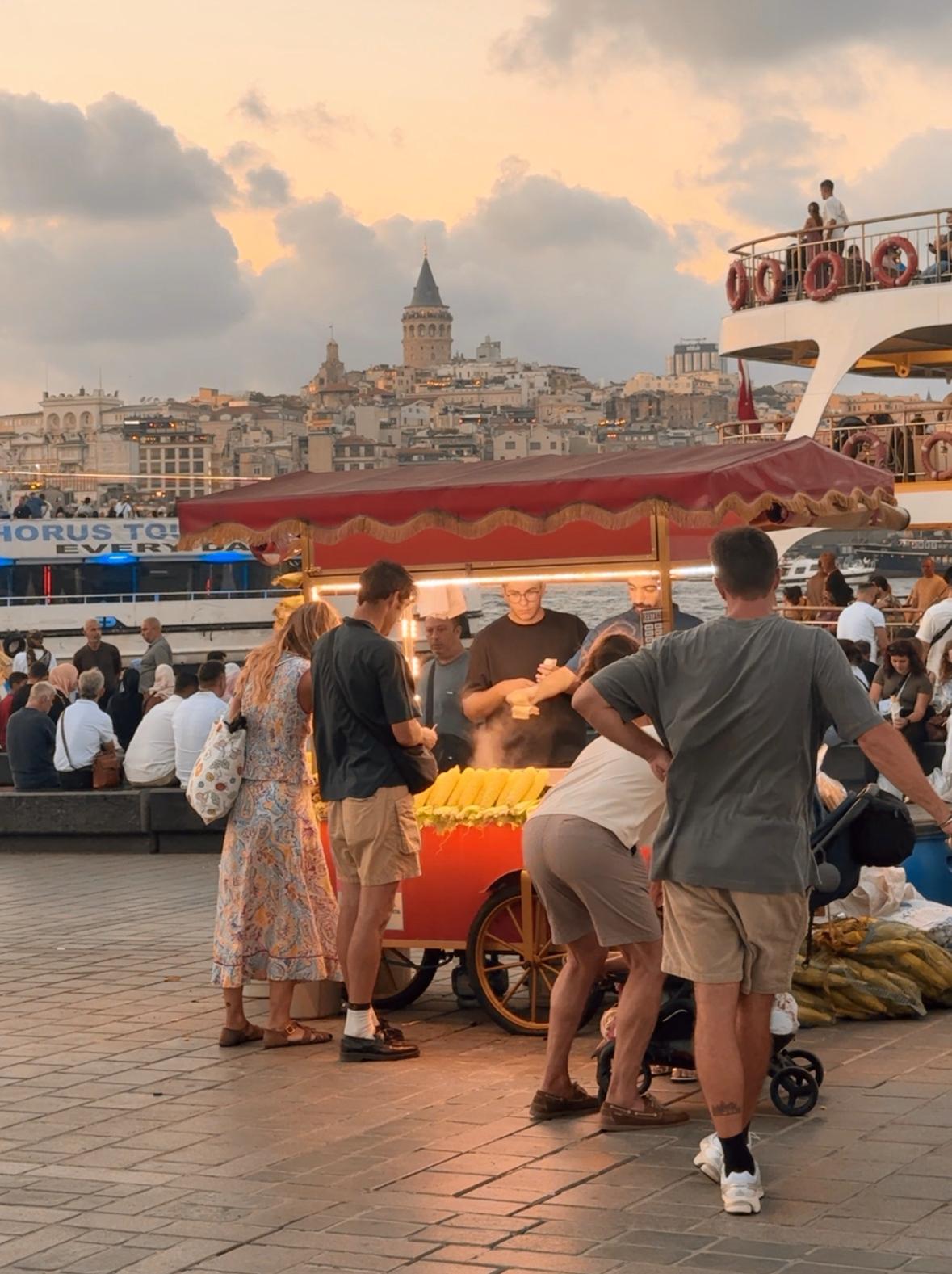 Street food in Eminönü with Galata Tower in the background, Istanbul